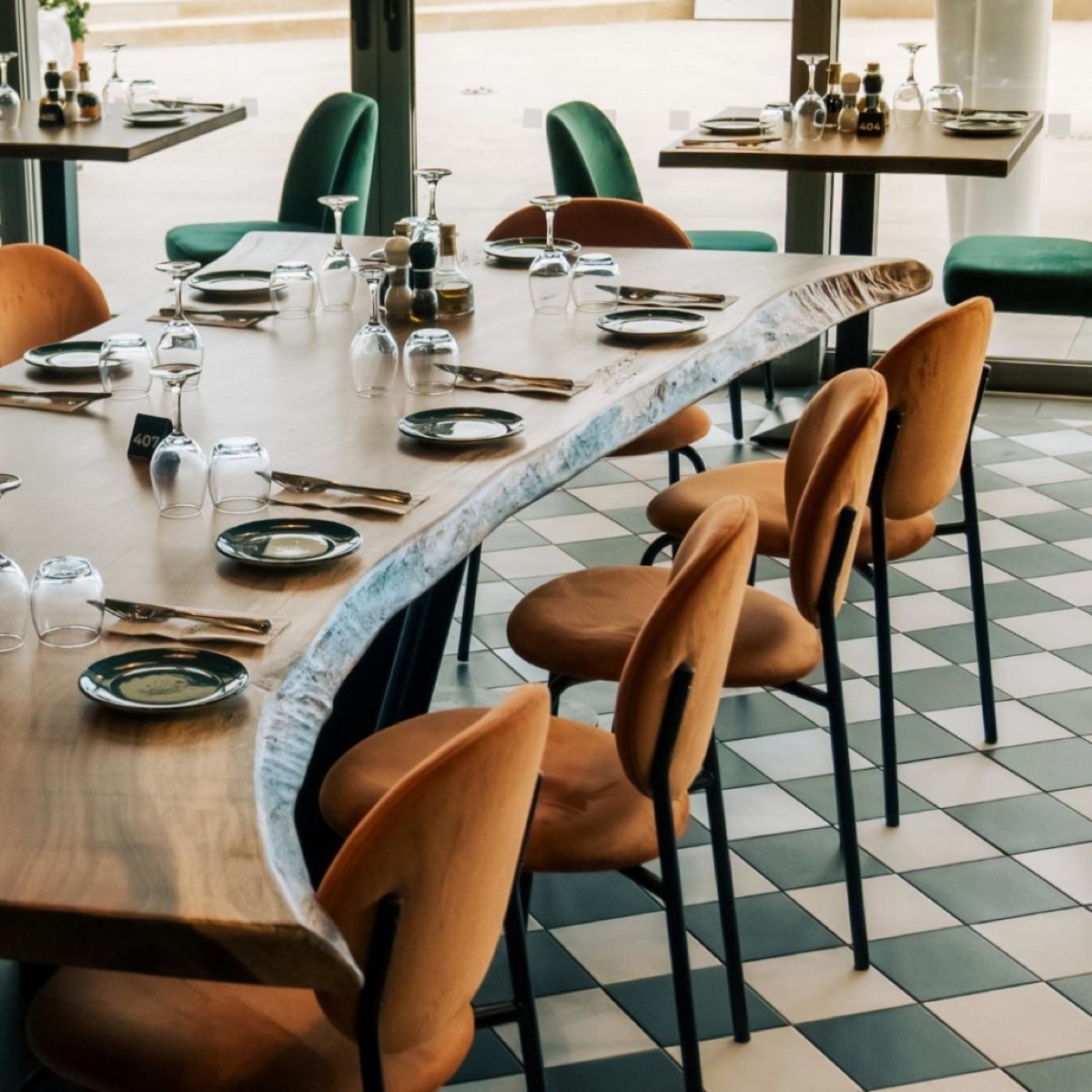Trattoria Riccardo dining room with live-edge tables