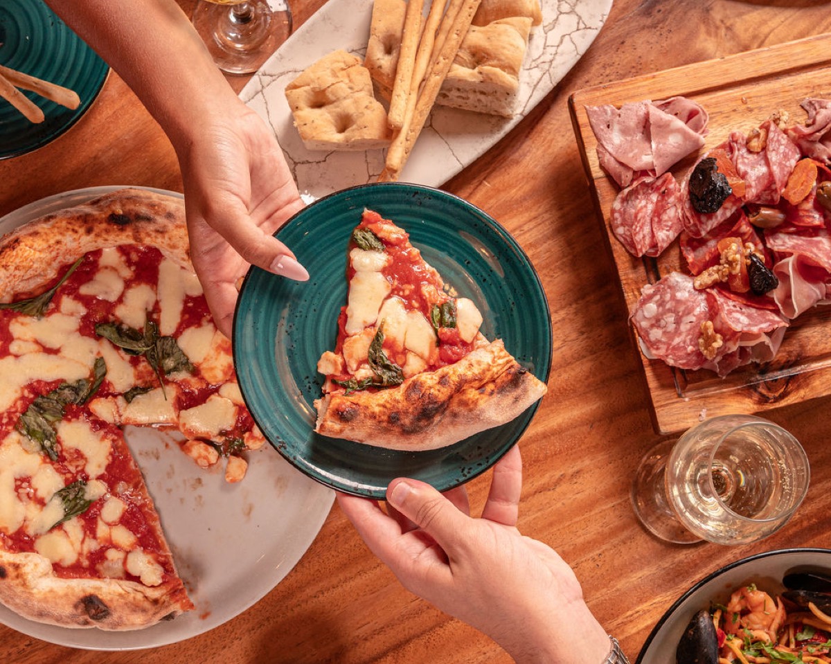 Wood-fired margherita pizza with an antipasto board